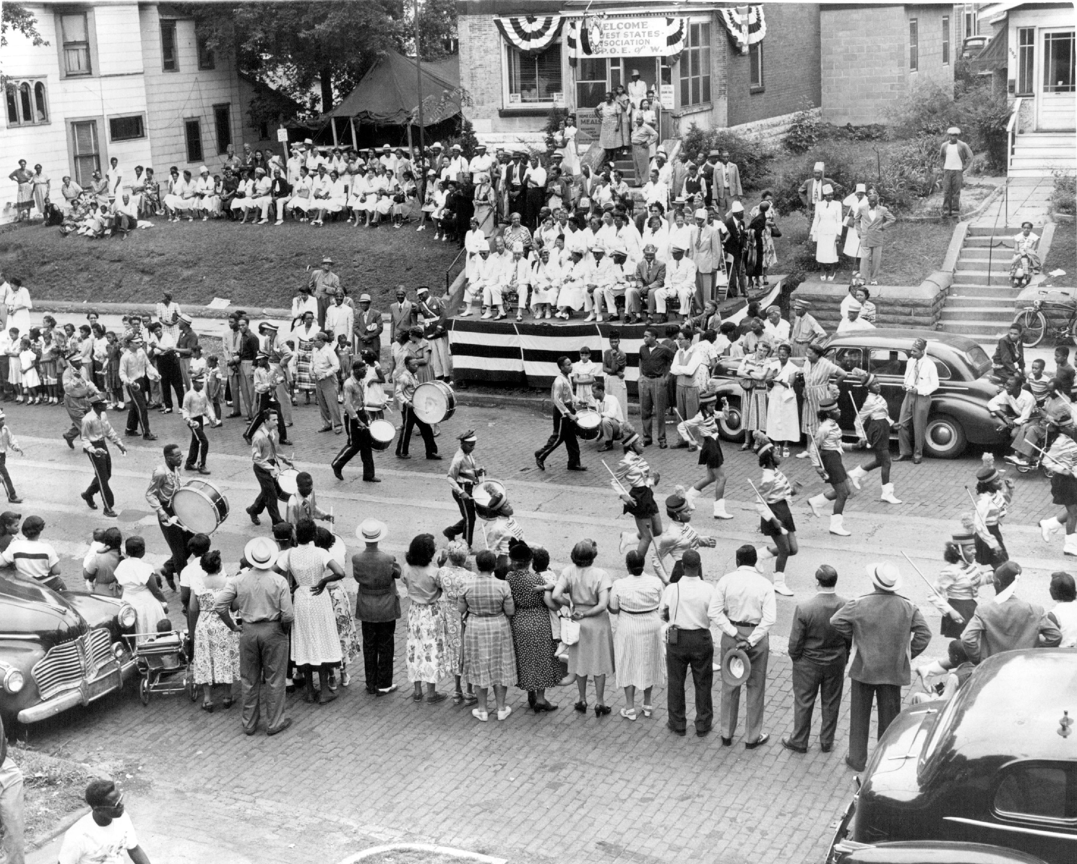 In July 1951, the Ralph Bates Marching Club from Omaha, Nebraska, passed the reviewing stand at 588 Rondo Ave. in St. Paul during a parade.