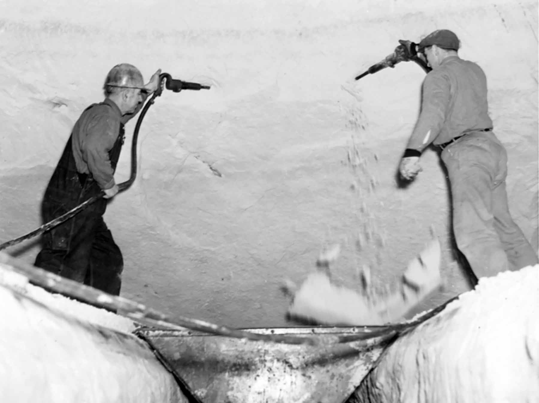 Workers mine silica sand in the tunnels beneath the Ford plant in St. Paul in this 1930s photo.