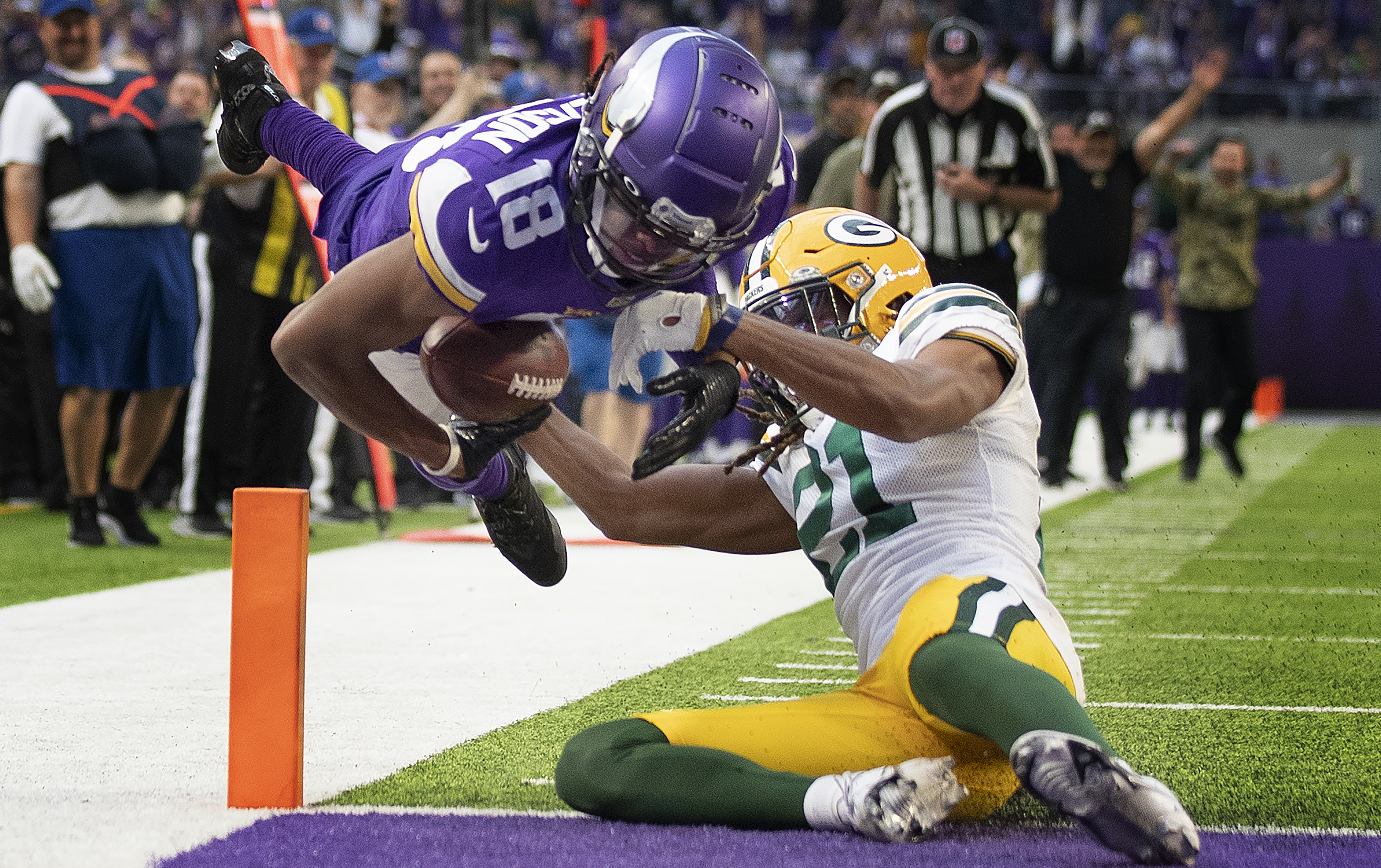 Cousins tosses 3 TDs, Vikings beat Packers