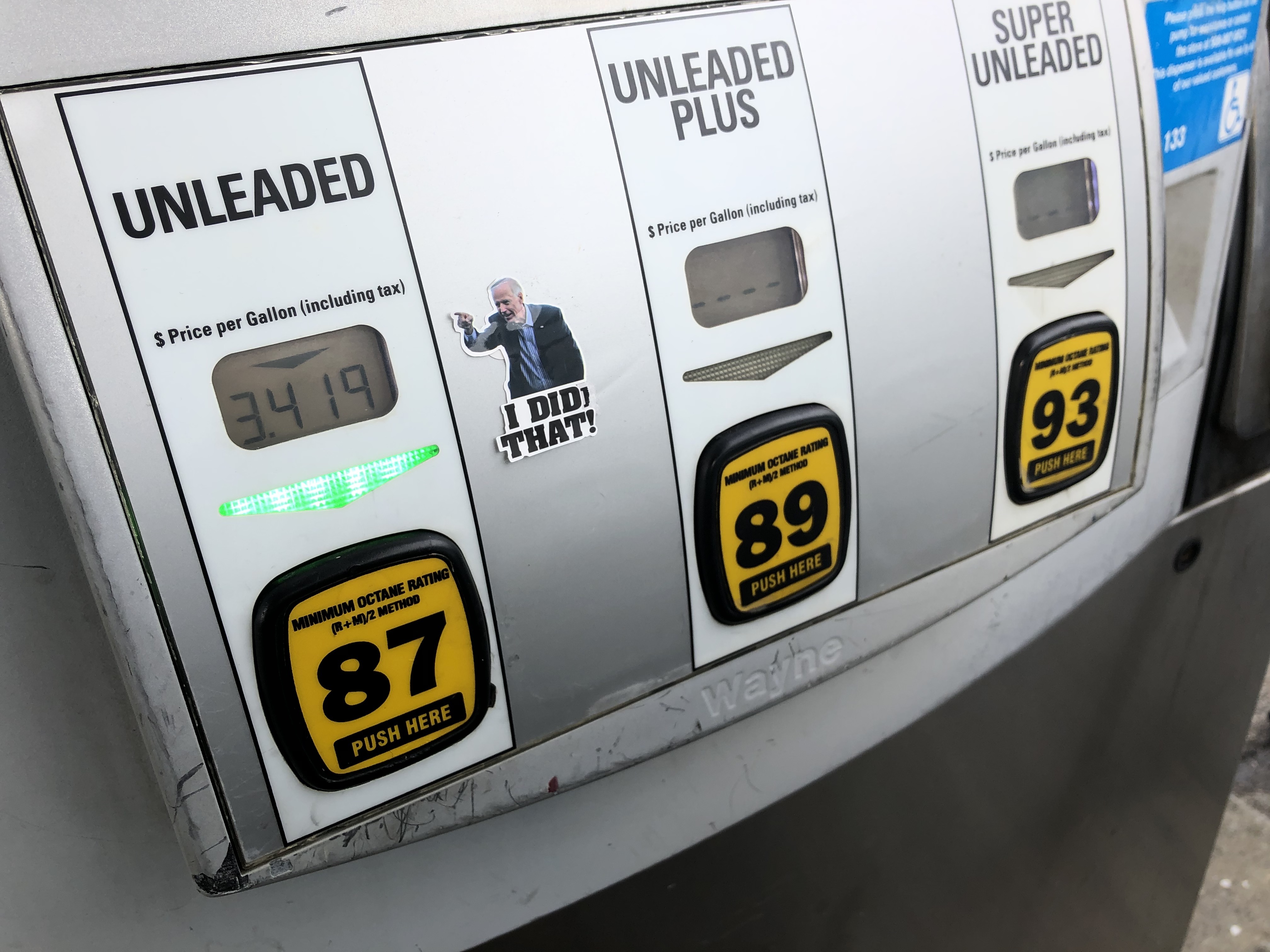 A gas pump at Cumberland Farms in Grafton, Massachusetts, with the “I did that” sticker featuring an image of President Joe Biden.