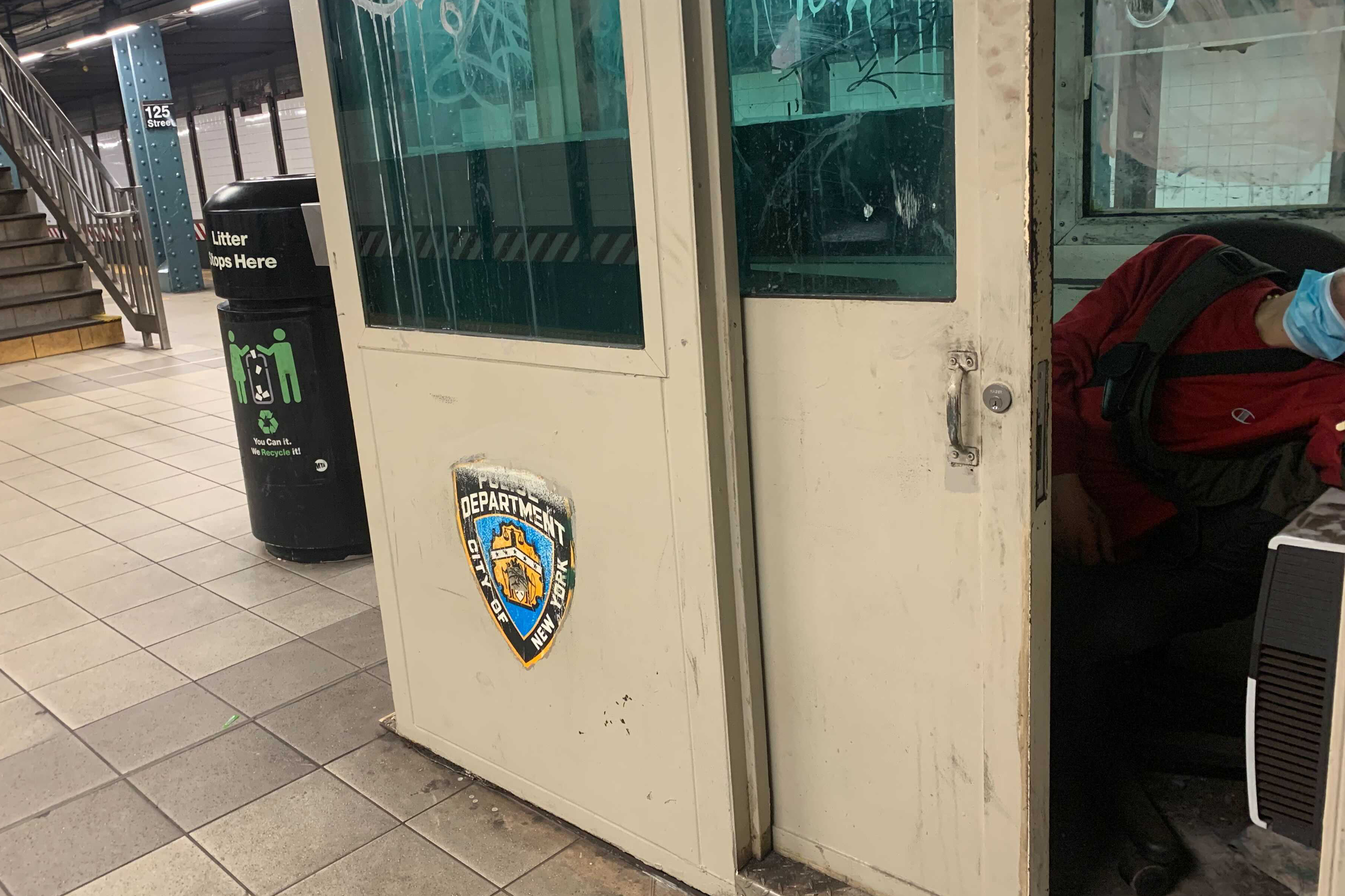 A man was sleeping in an unused NYPD booth at the Lexington Avenue 4/5/6 station Thursday morning.