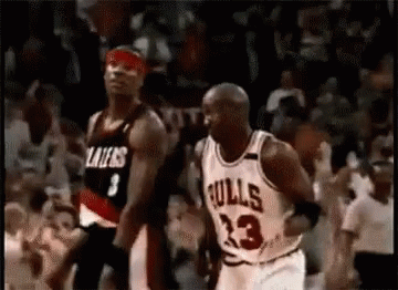 Michael Jordan shrugging while running down the court