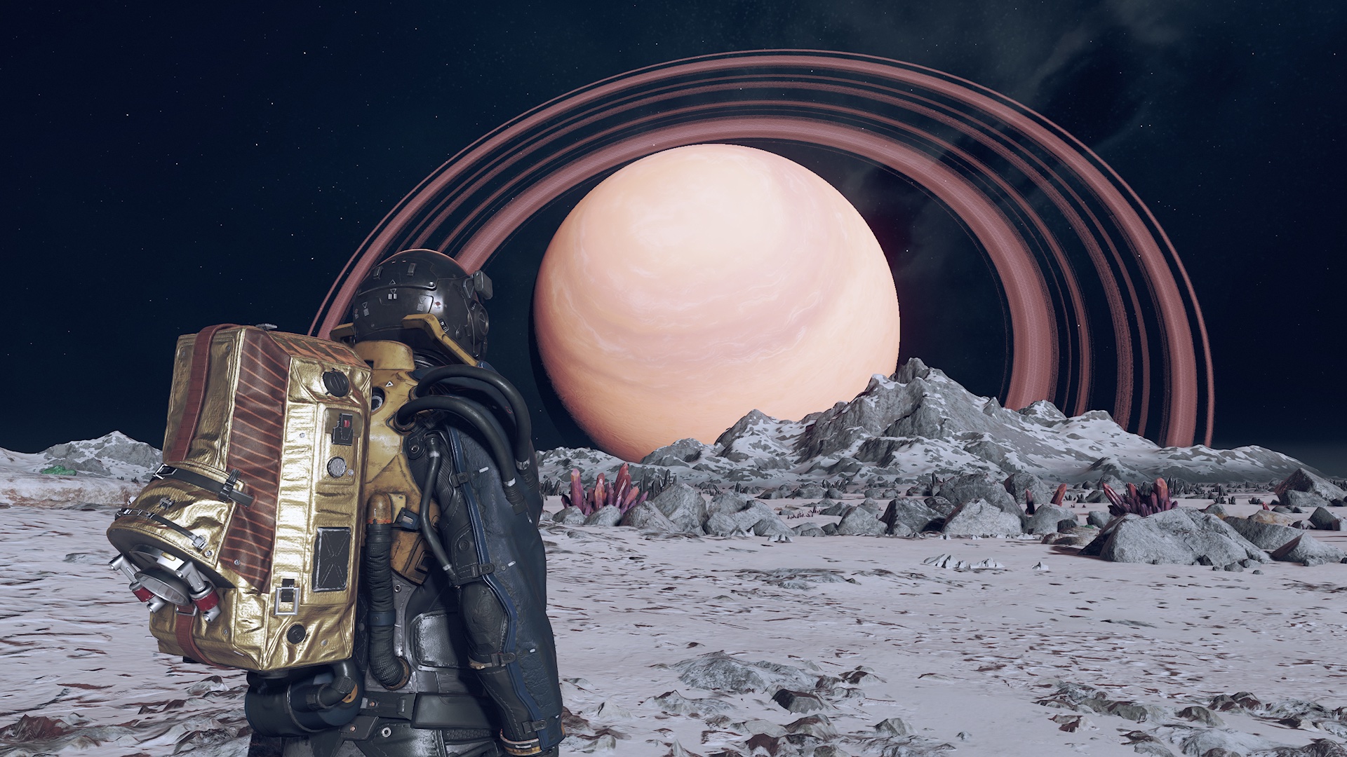 An explorer stares at a gas giant while standing on a lunar satellite in Starfield, the 2023 game of the year.