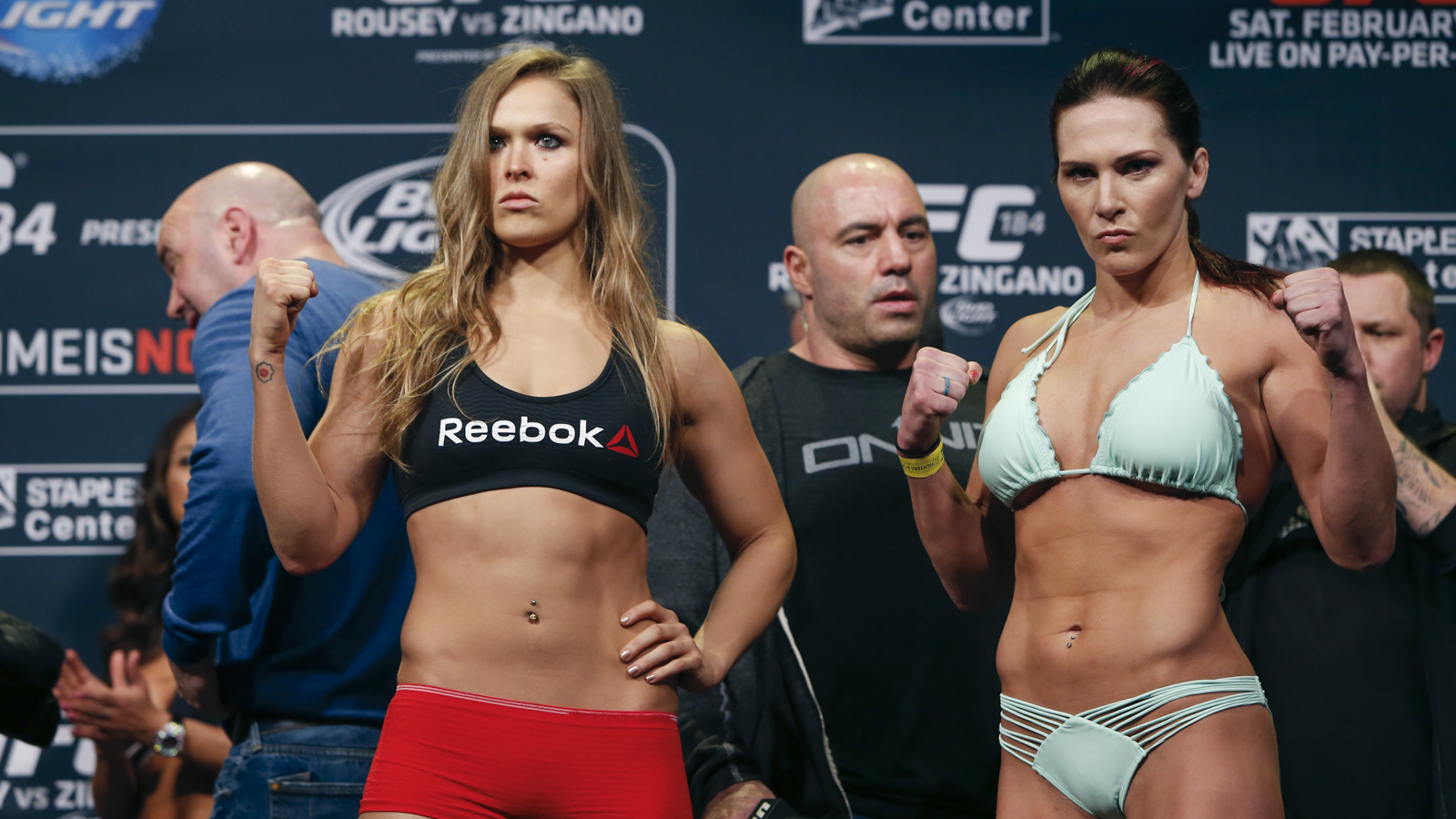 Ronda Rousey and Cat Zingano face forward during the UFC 184 weigh-ins at T...
