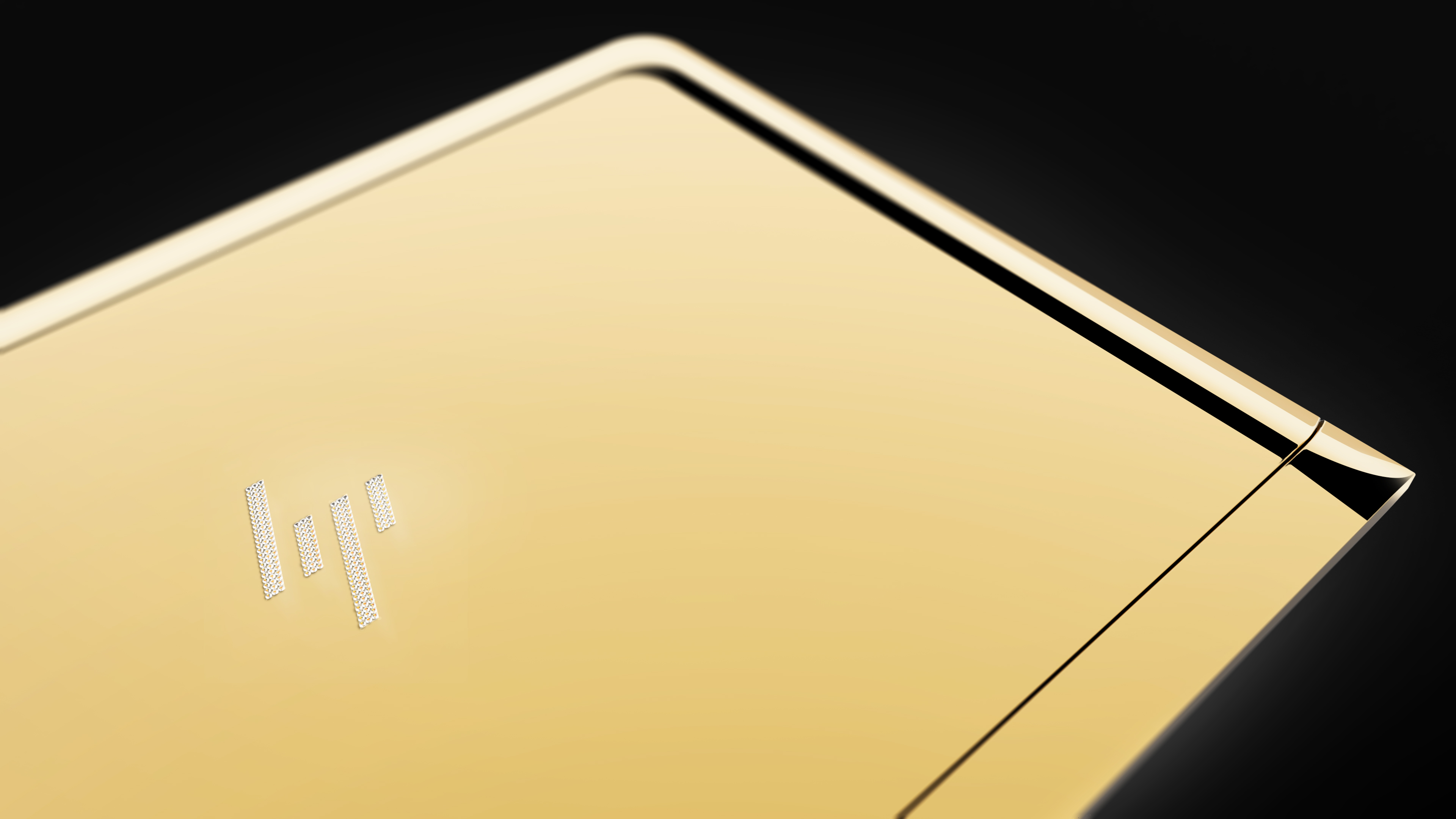 Hp Is Auctioning Off Gold Plated Diamond Studded Versions Of Its Thin New Laptop The Verge