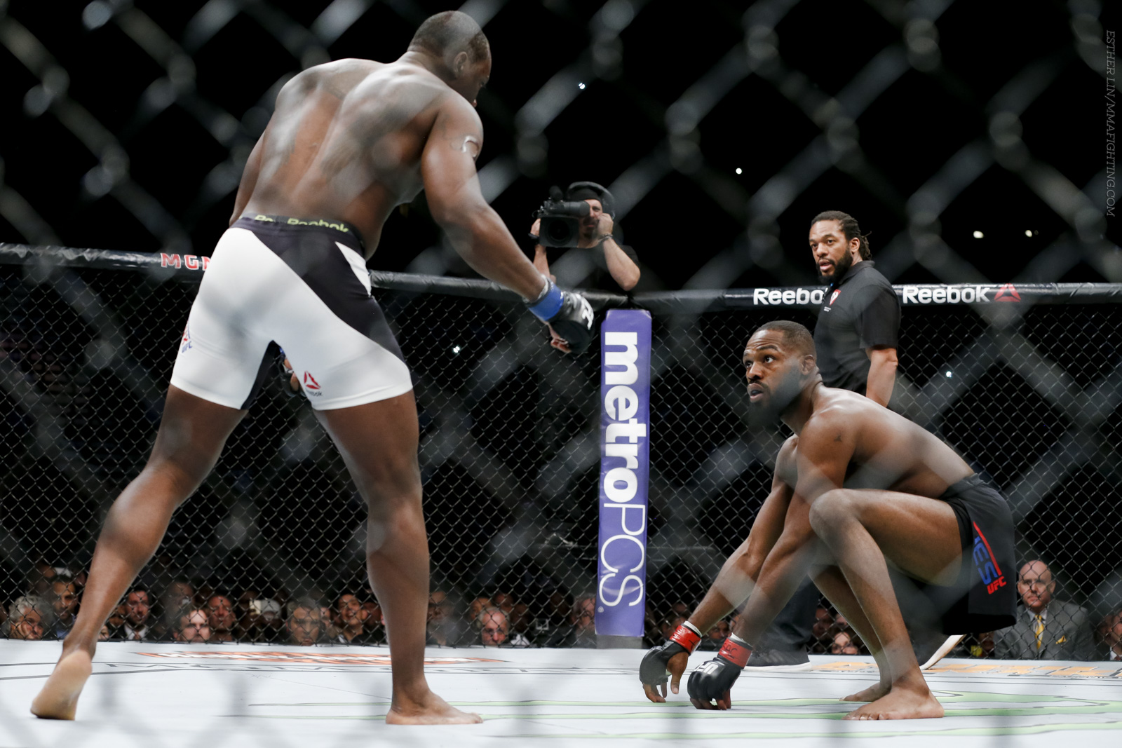 Jon Jones opens up Round 1 from his signature crouched position at UFC 197 ...