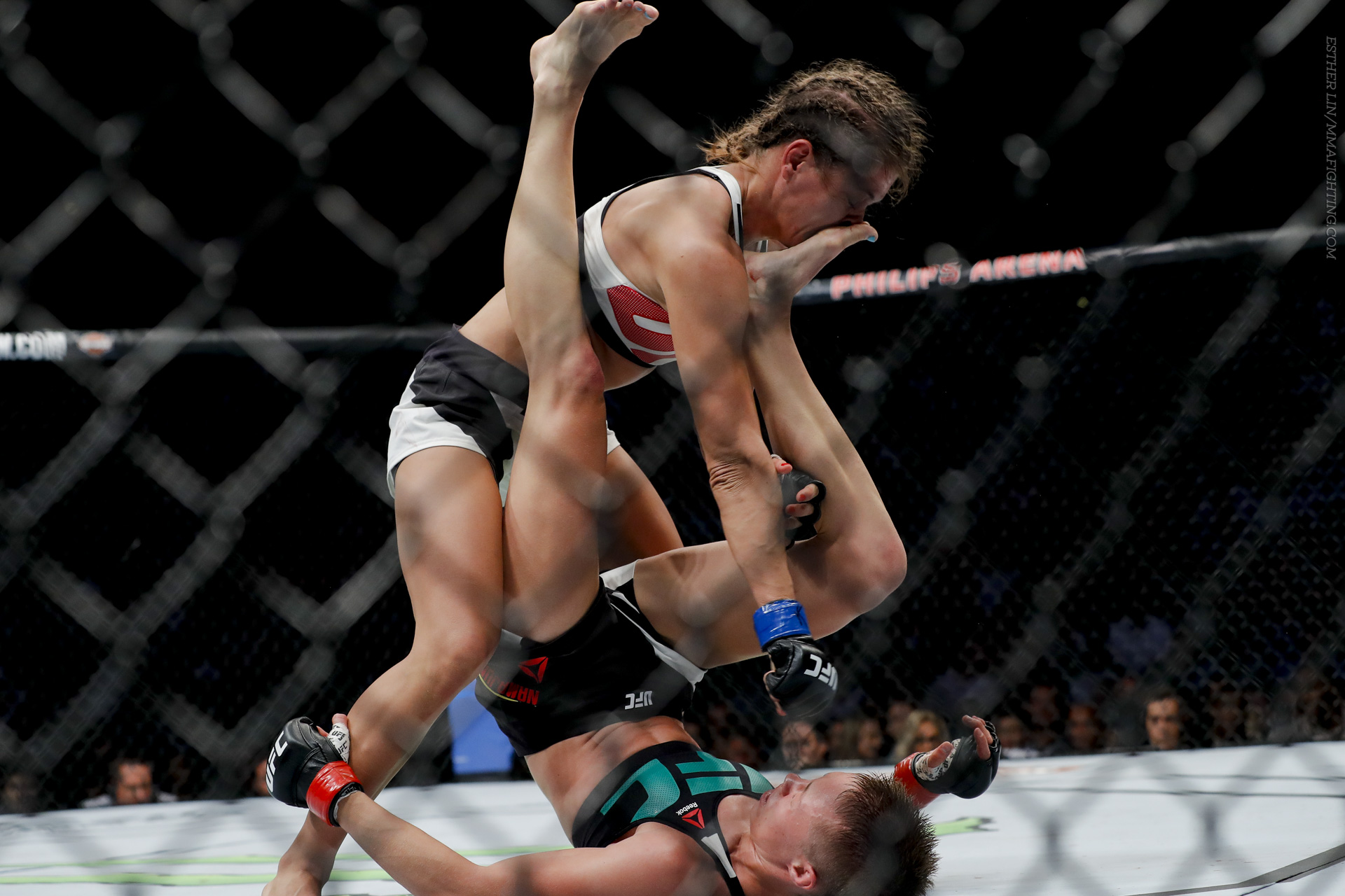 Karolina Kowelkiewicz stacks Rose Namajunas during UFC 201 at the Philips A...