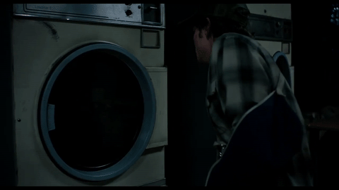 GIF of a a hand appearing suddenly inside a laundry machine in ‘The New Mutants’