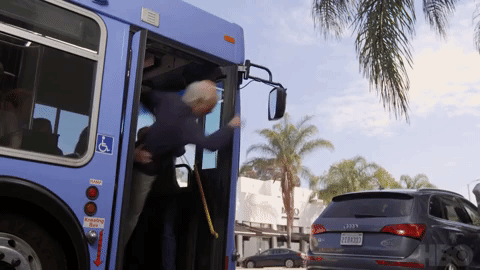 GIF of Larry getting thrown off a bus in ‘Curb Your Enthusiasm’
