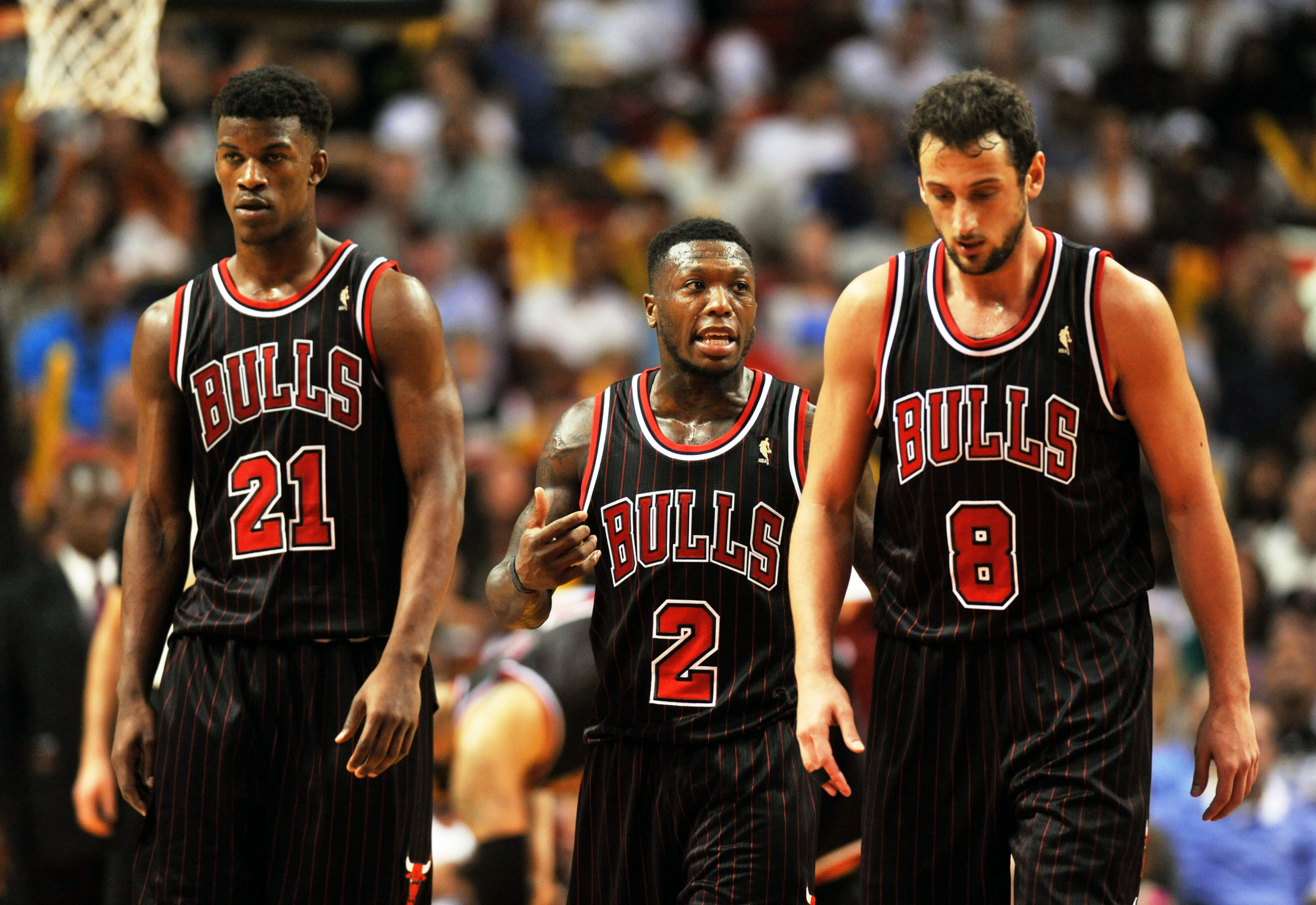 Jimmy Butler, Nate Robinson, and Marco Belinelli 