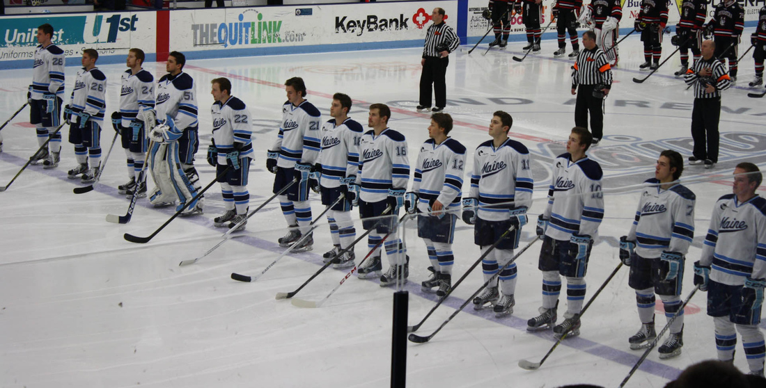 Ryan Lomberg (7), 2nd from right, is an NHL Draft prospect.