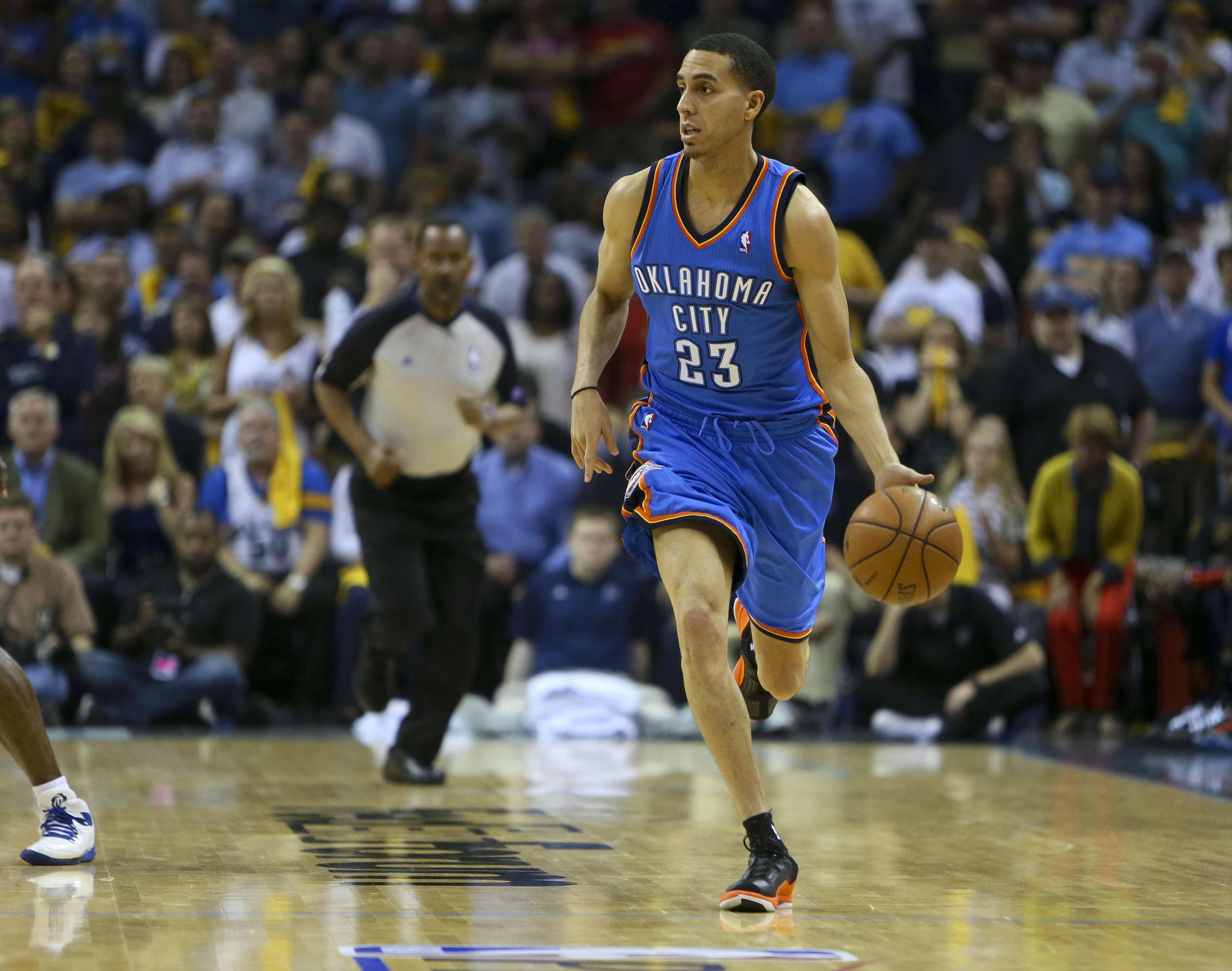 Kevin Martin takes the ball up the floor.