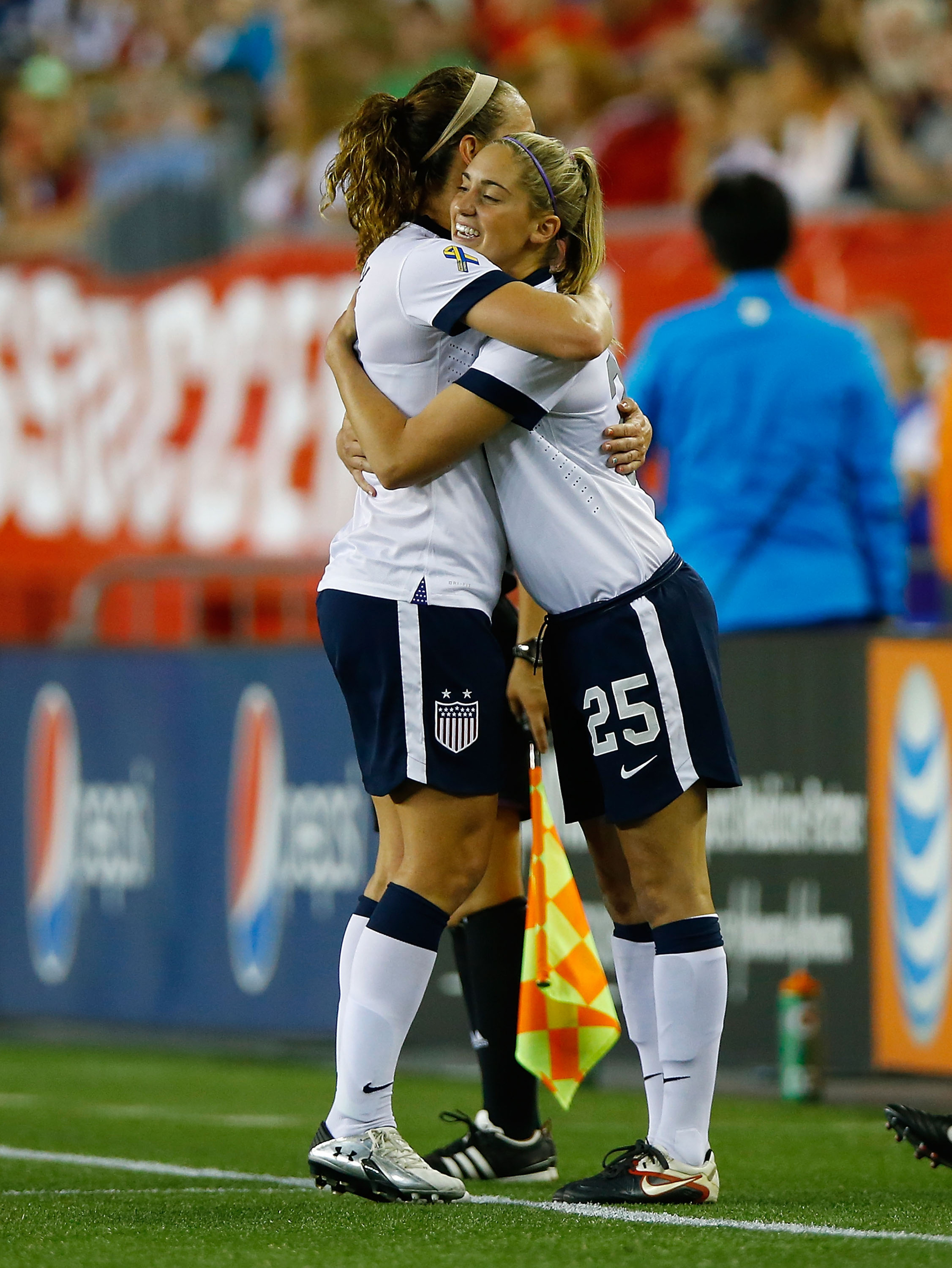 Morgan Brian (right) has plenty of reason to smile after netting a goal for the US last night.