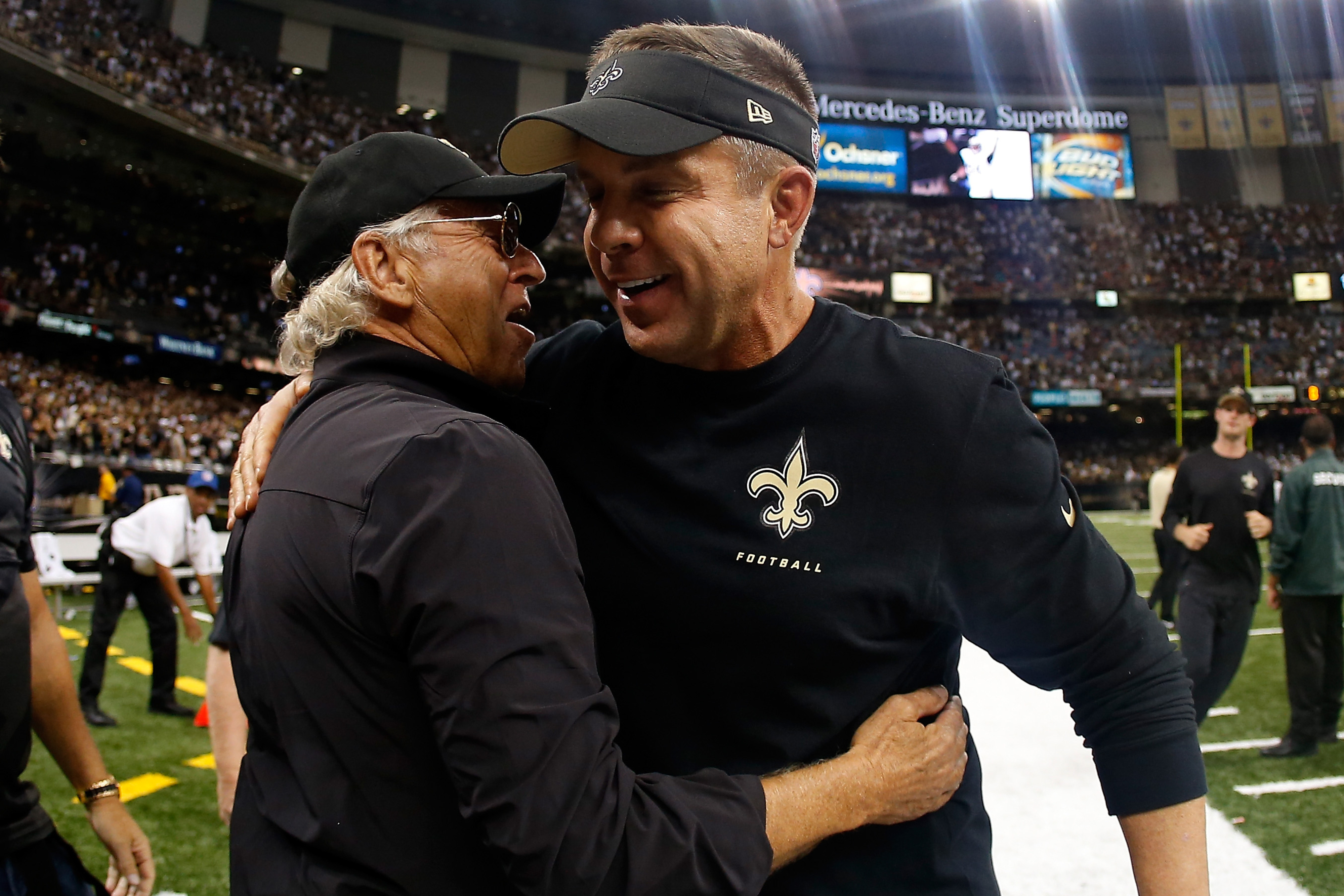 Sean Payton celebrates with Jimmy Buffett after defeating the Falcons on September 8, 2013