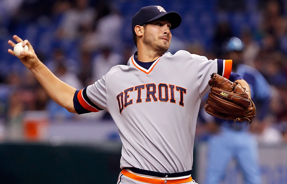 Male model Rick Porcello shows off the Tigers throwback jerseys