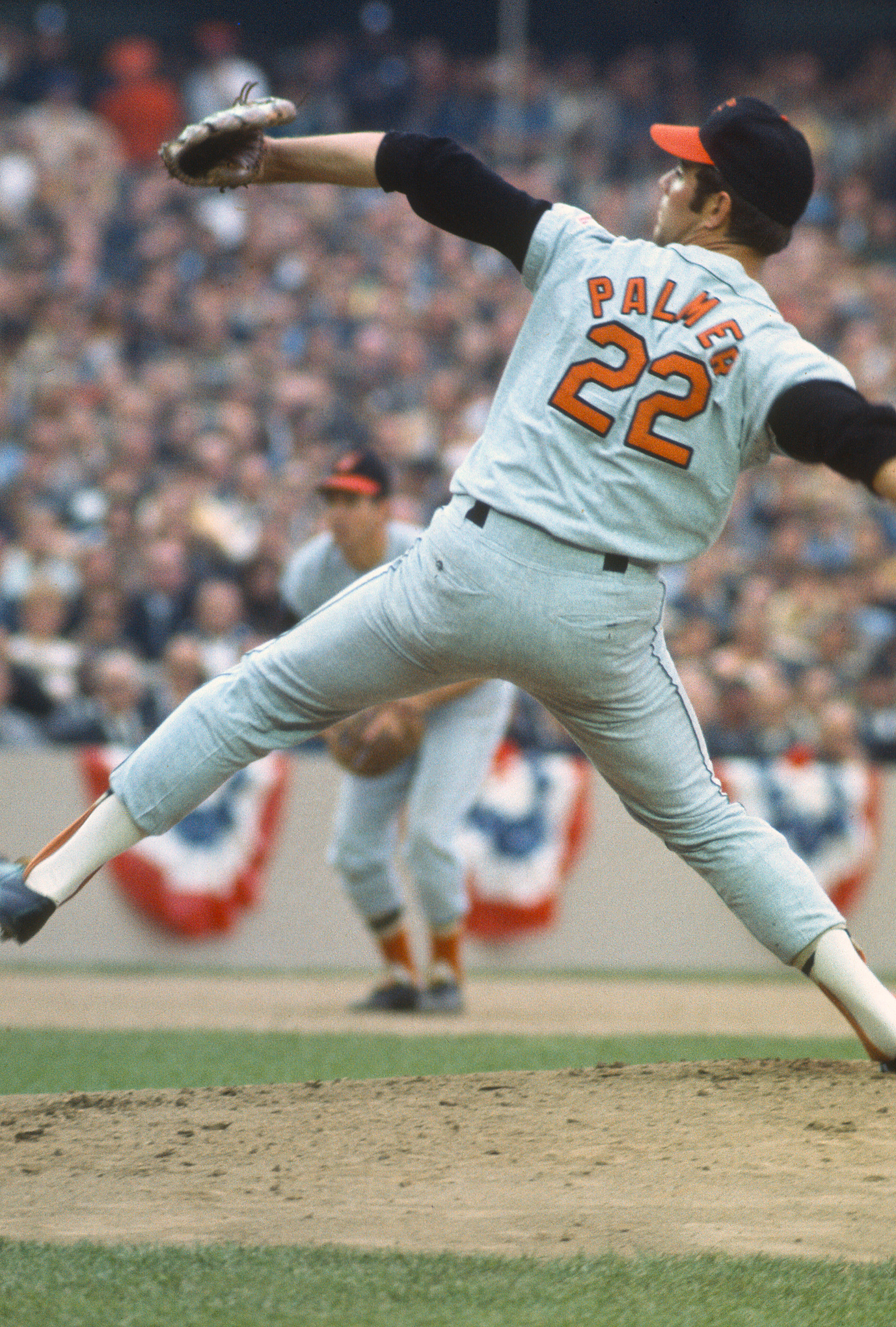 October 14, 1969: Jim Palmer #22 of the Baltimore Orioles pitches against the New York Mets during Game 3 of the 1969 World Series at Shea Stadium.