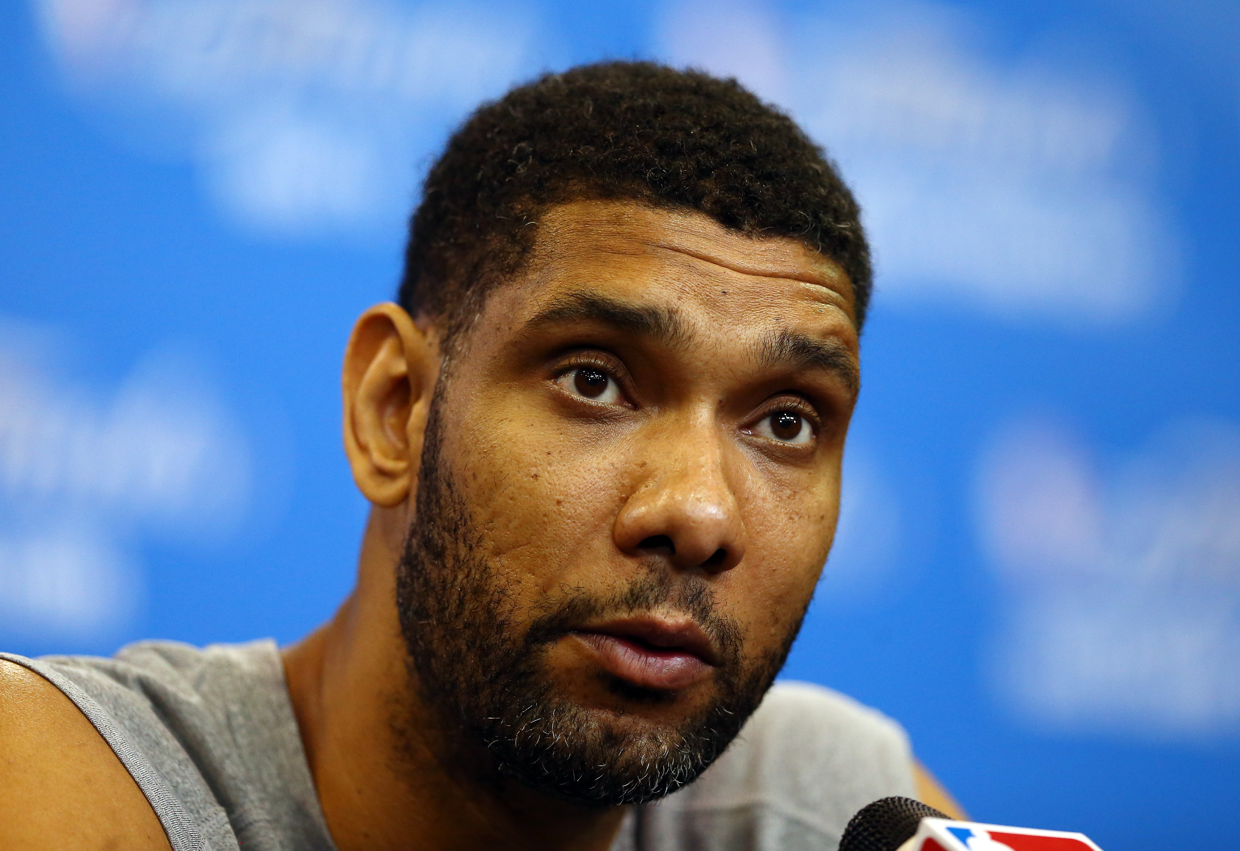 Tim Duncan fields questions during a press conference after the announcement of his WoW accomplishment