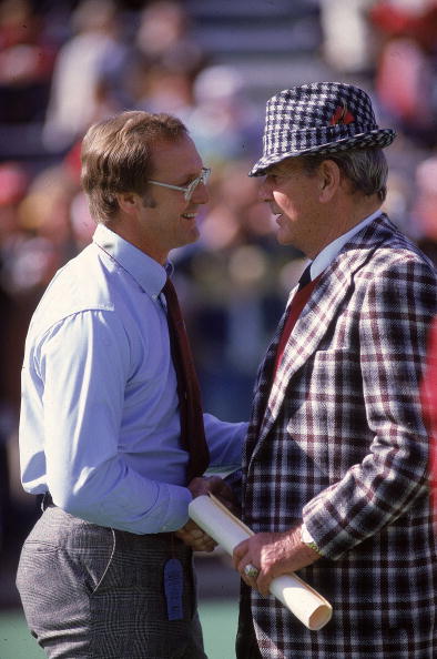 Alabama coach Paul Bear Bryant (L) shaking hands with Louisiana State coach Jerry Stovall (R) before game, Birmingham, AL 11/6/1982