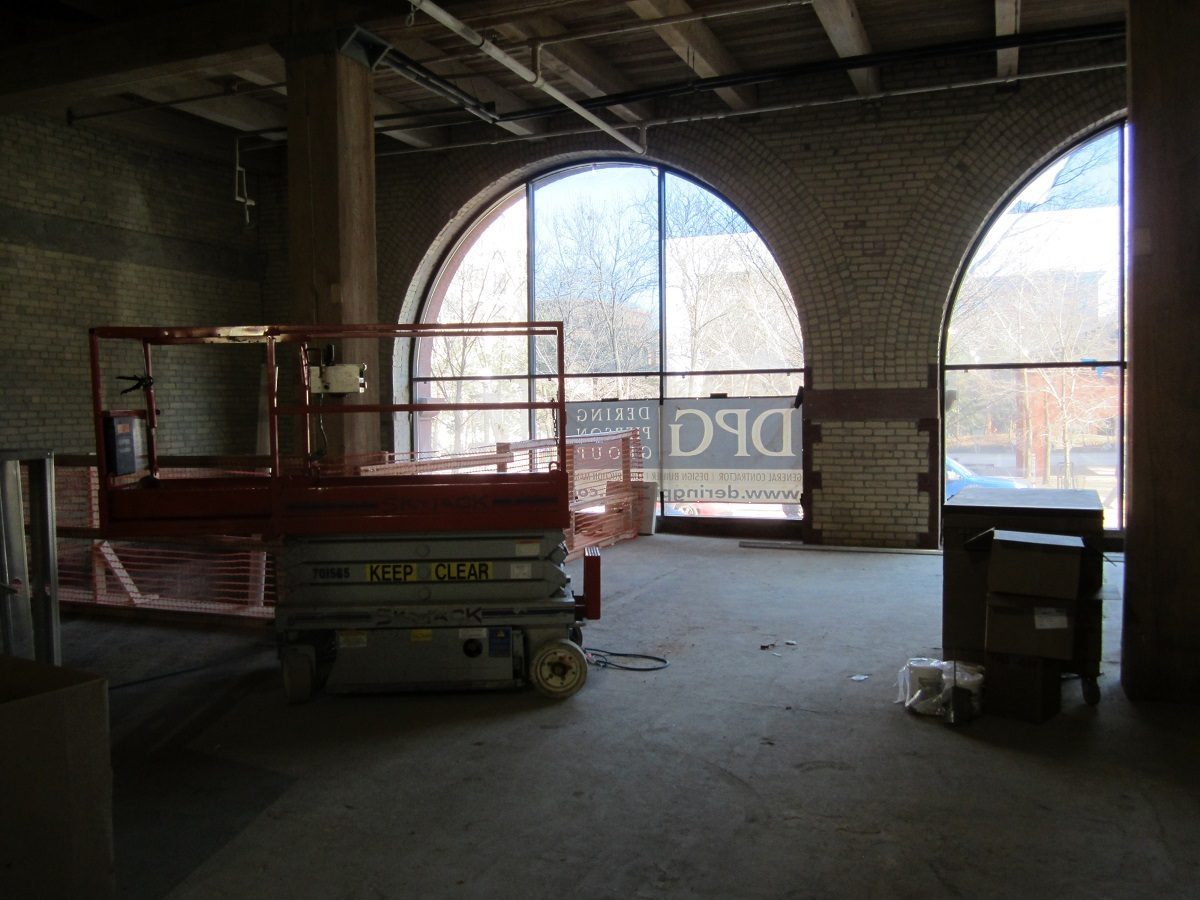 The floor to ceiling windows on the main level overlook Mears Park.