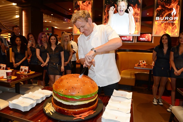 Gordon Ramsay slices a giant hamburger cake 