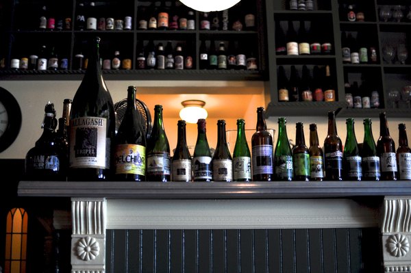 Bottles all lined up at the Trappist. 