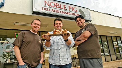  John Bates and Brandon Martinez with Adam Richman at their Noble Pig deli and charcuterie in North Austin. 