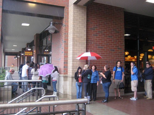 Even on a rainy day, the line winds around the corner.