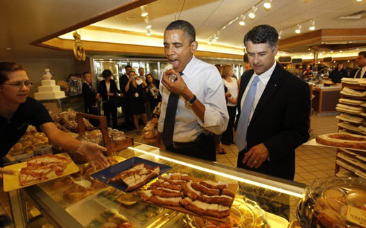 President Obama takes a bite.  