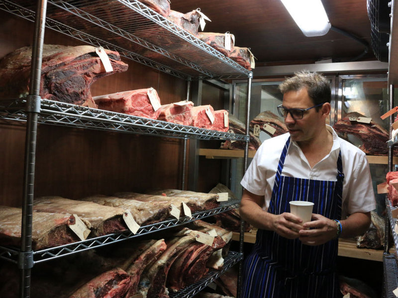 Tesar checks on his meat-aging room at Knife.