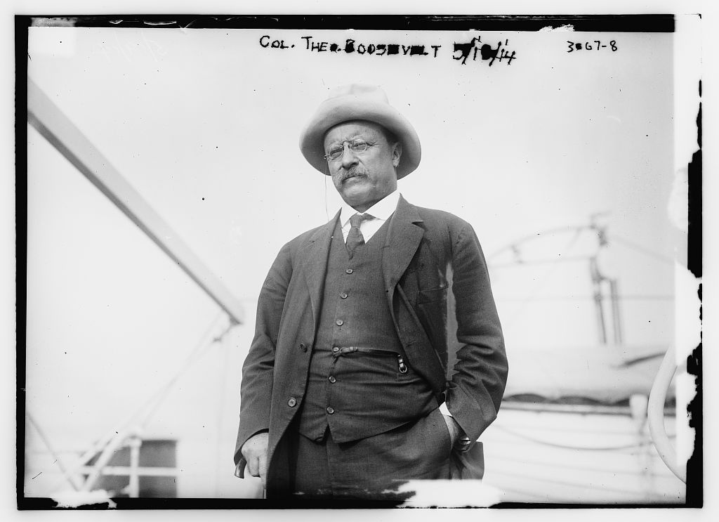 Photograph shows former President Theodore Roosevelt on the deck of the steamship Aidan, in New York harbor, after his expedition to South America.