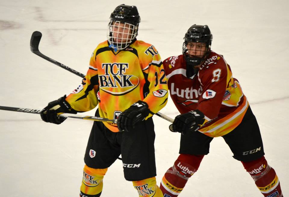 Brock Boeser (left) battles for position in an Upper Midwest High School Elite League game last year.