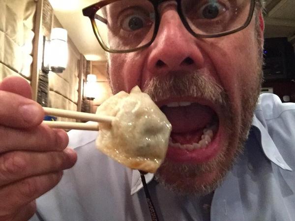 Alton Brown eats a post-show dumpling at Dumpling Cafe