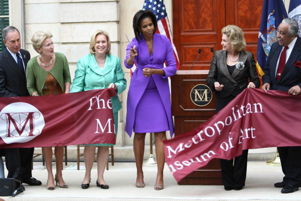 Michelle Obama at the ribbon cutting for the American Wing At Metropolitan Museum Of Art in 2009, image via Getty