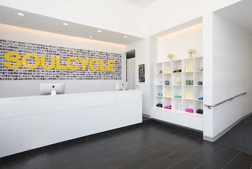 A SoulCycle interior via <a href="http://ny.racked.com/archives/2013/10/16/soulcycles_new_101_program_will_teach_you_how_to_soulcycle.php">Racked NY</a>