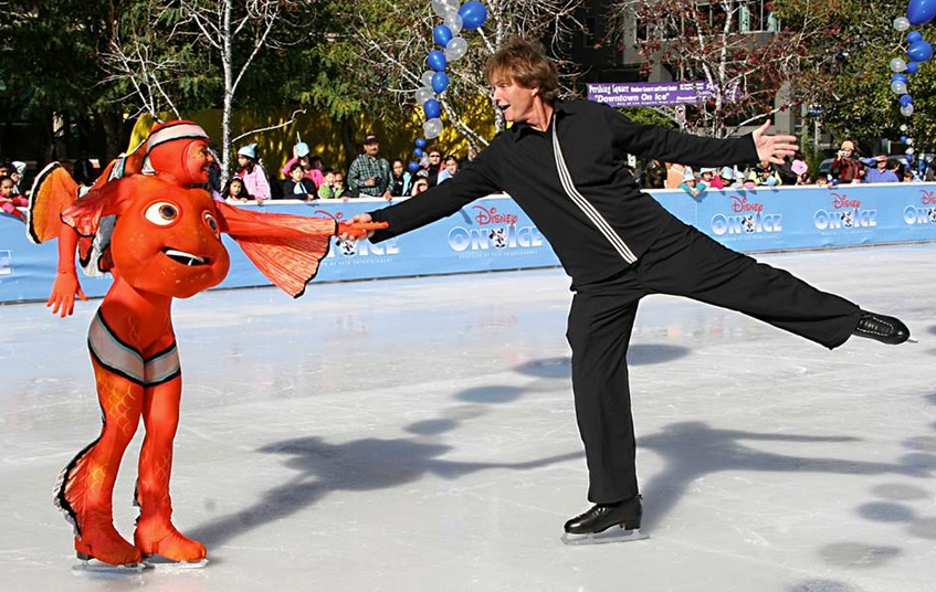 Bruce Jenner and what we're assuming is a figure skater dressed as Nemo. Photo <a href="https://www.facebook.com/photo.php?fbid=190585501145110&amp;set=pb.158692357667758.-2207520000.1384478591.&amp;type=3&amp;theater">via</a>.