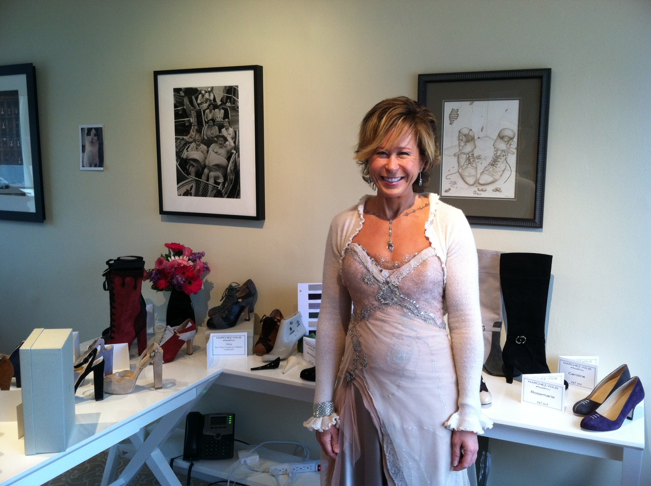Yeardley in front of styles from her fall 2013 collection. It was "gown Wednesday" in the office.