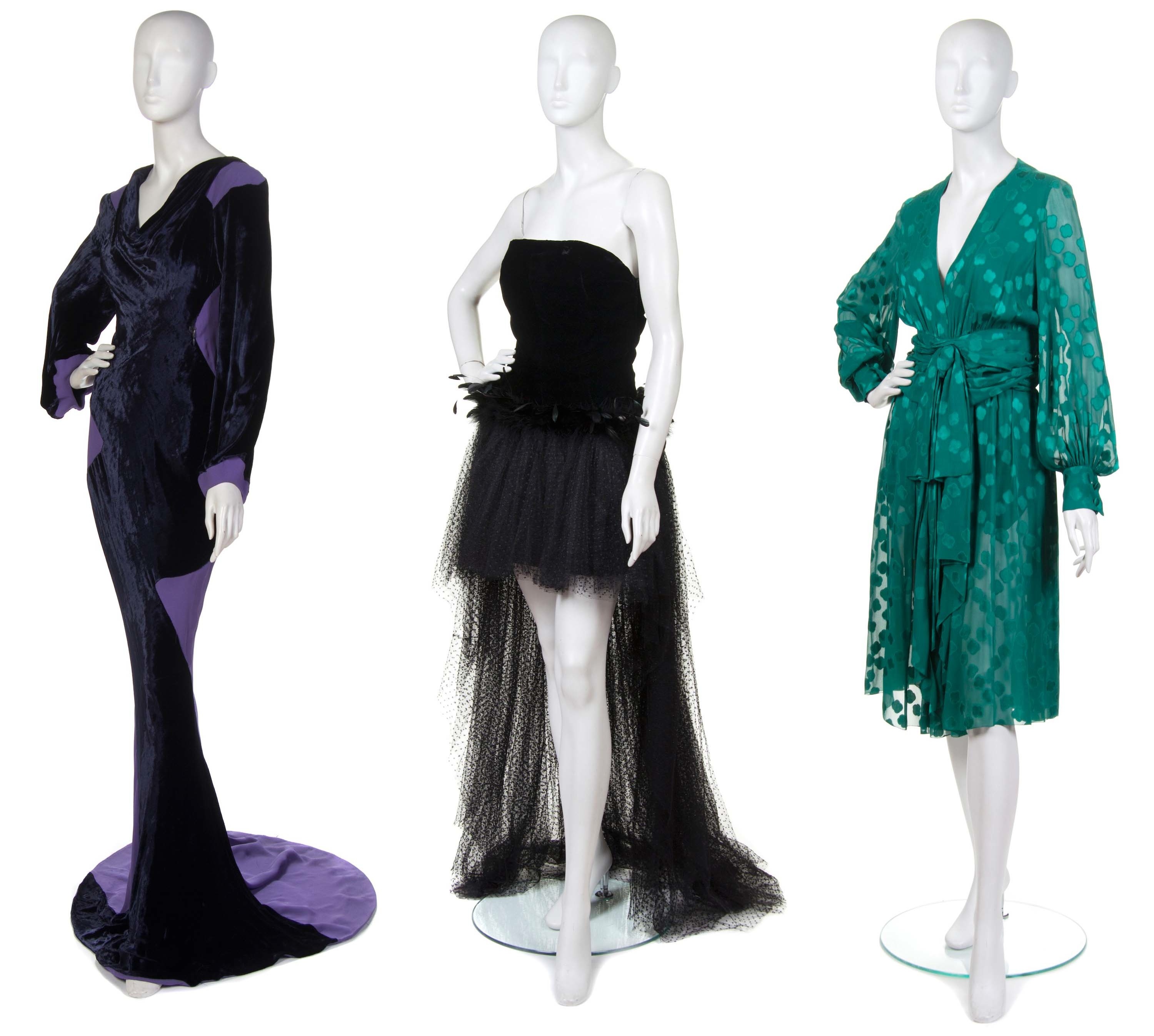 <strong>Vivienne Westwood</strong> evening gown in navy velvet and purple crepe—$300-$500; <strong>Givenchy</strong> evening gown in black velvet, lace and feathers—$300-500; <strong>Christian Dior</strong> dress in green jacquard—$400-600.