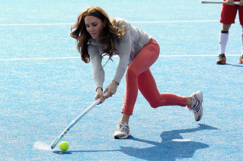 Kate Middleton plays field hockey. Photo via Getty.