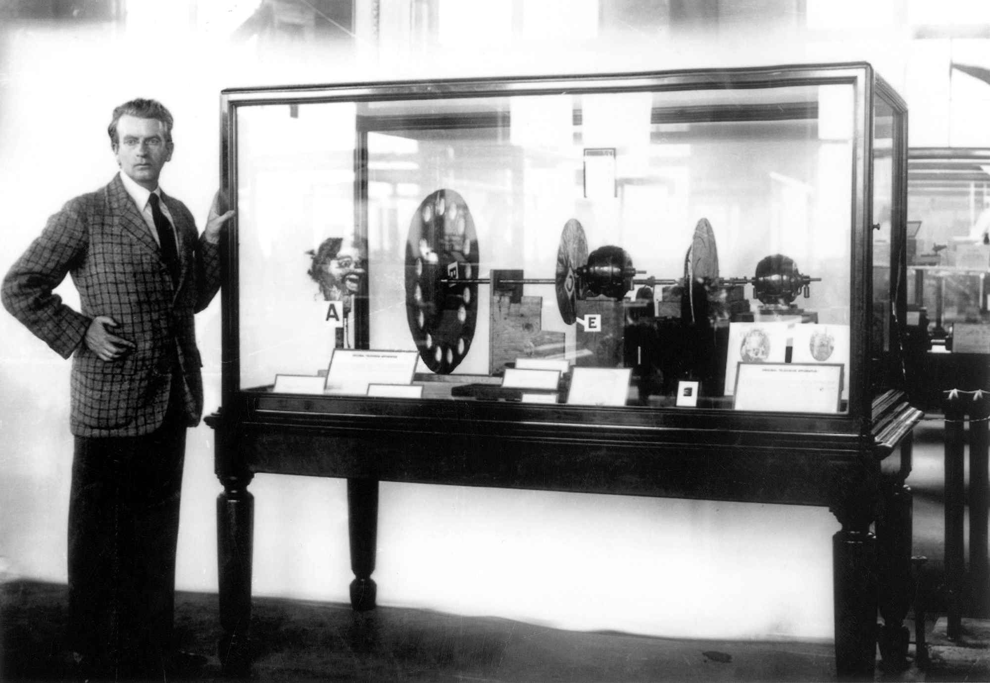 John Logie Baird with an early version of his invention.