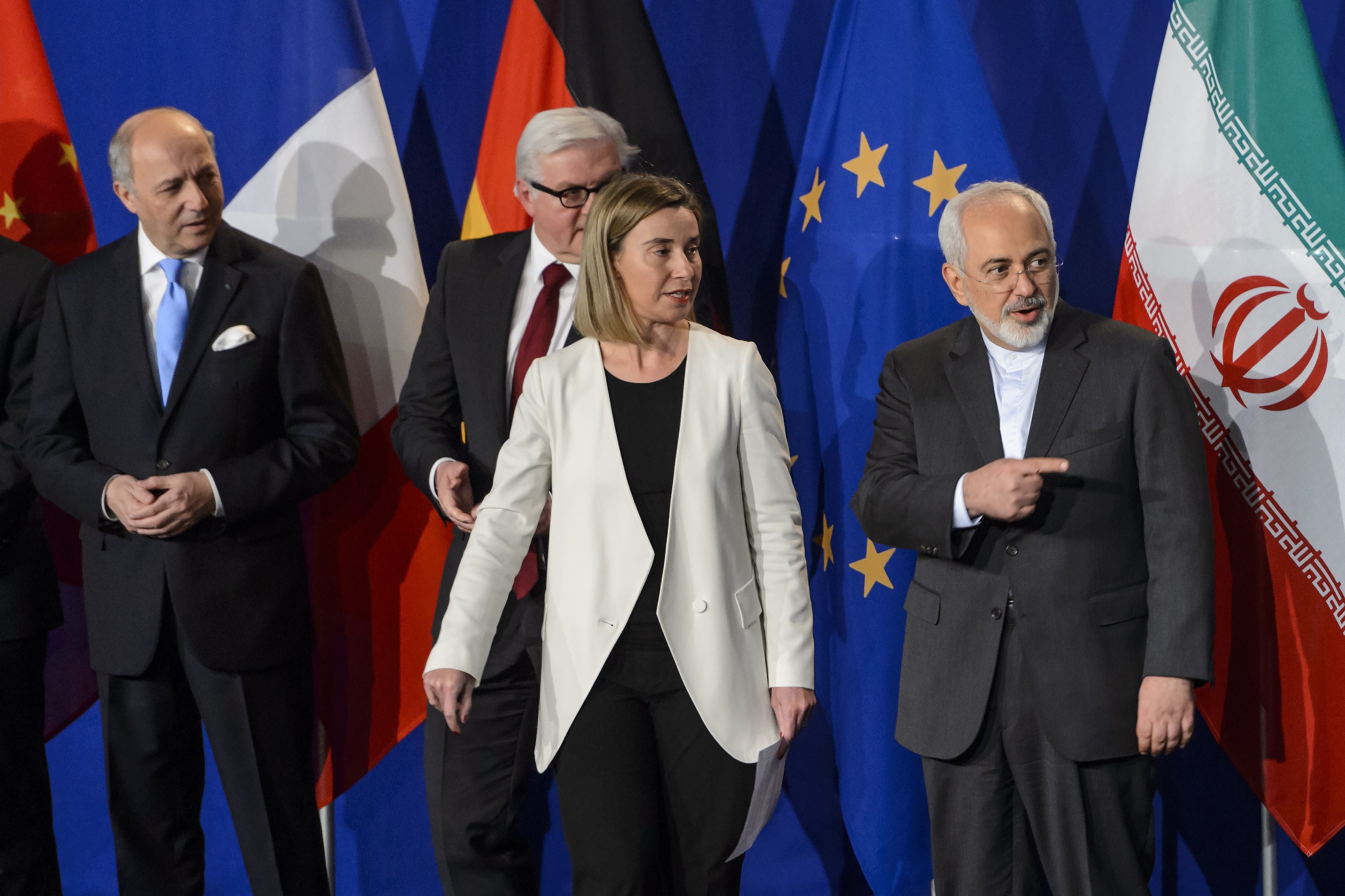 The EU's foreign policy chief Federica Mogherini, center, and Iranian Foreign Minister Javad Zarif, right.