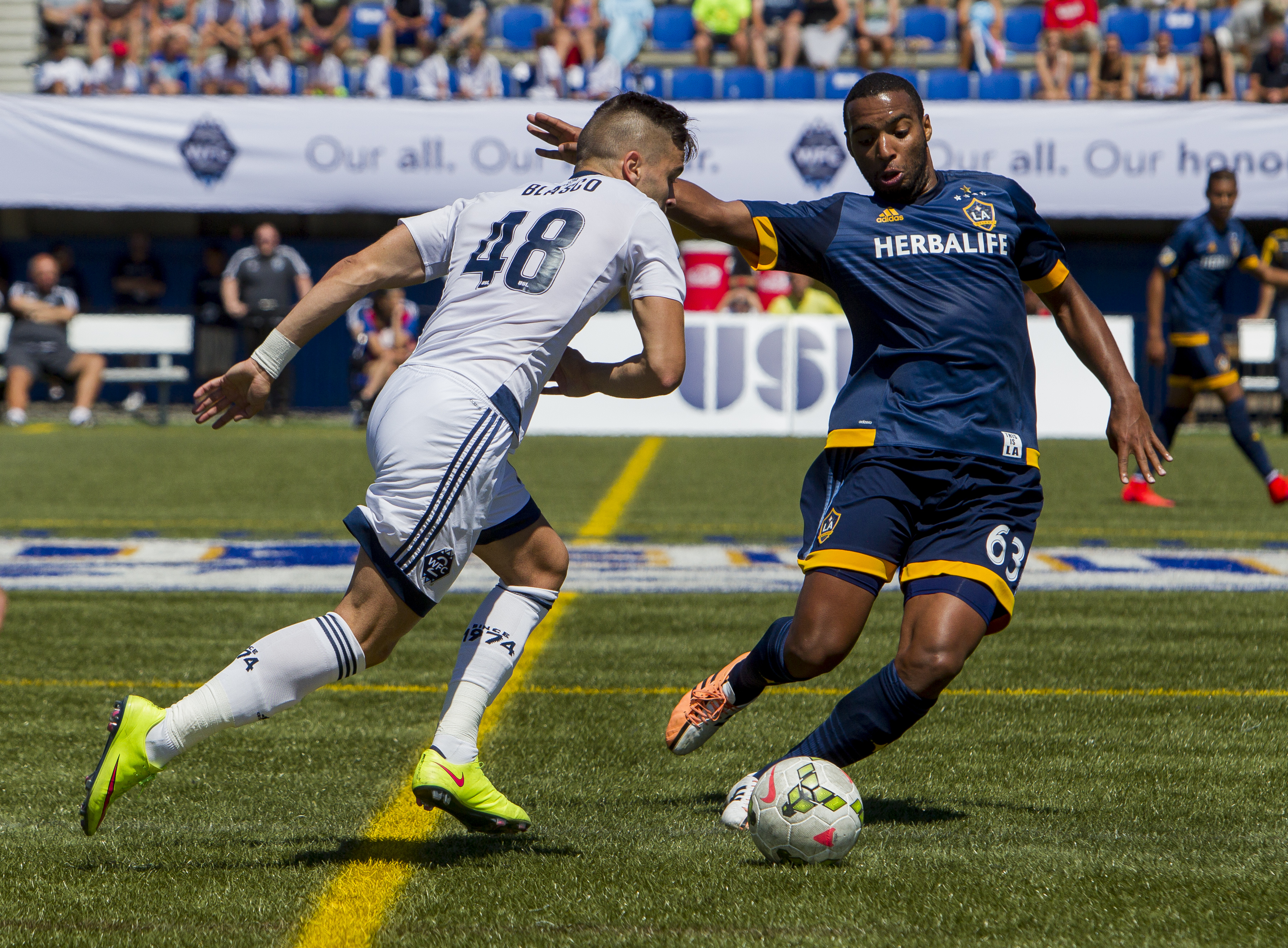Victor Blasco (L) and Andre Auras battle for the ball during a match between WFC2 and LA Galaxy 2. LA won the match 2-0.