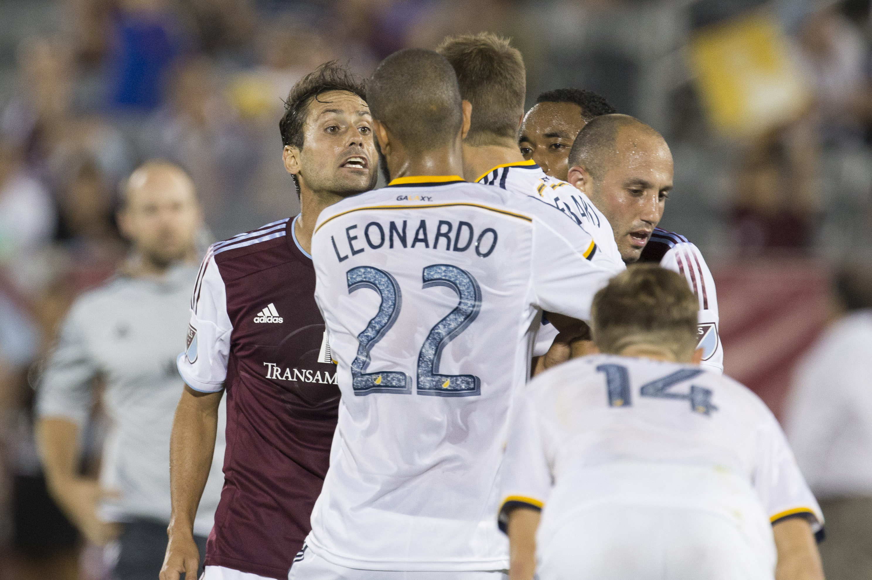 Marcelo Sarvas of the Rapids with a few words for Steven Gerrard after Gerrard kicked the ball into Juan Ramiez's face late in the match.