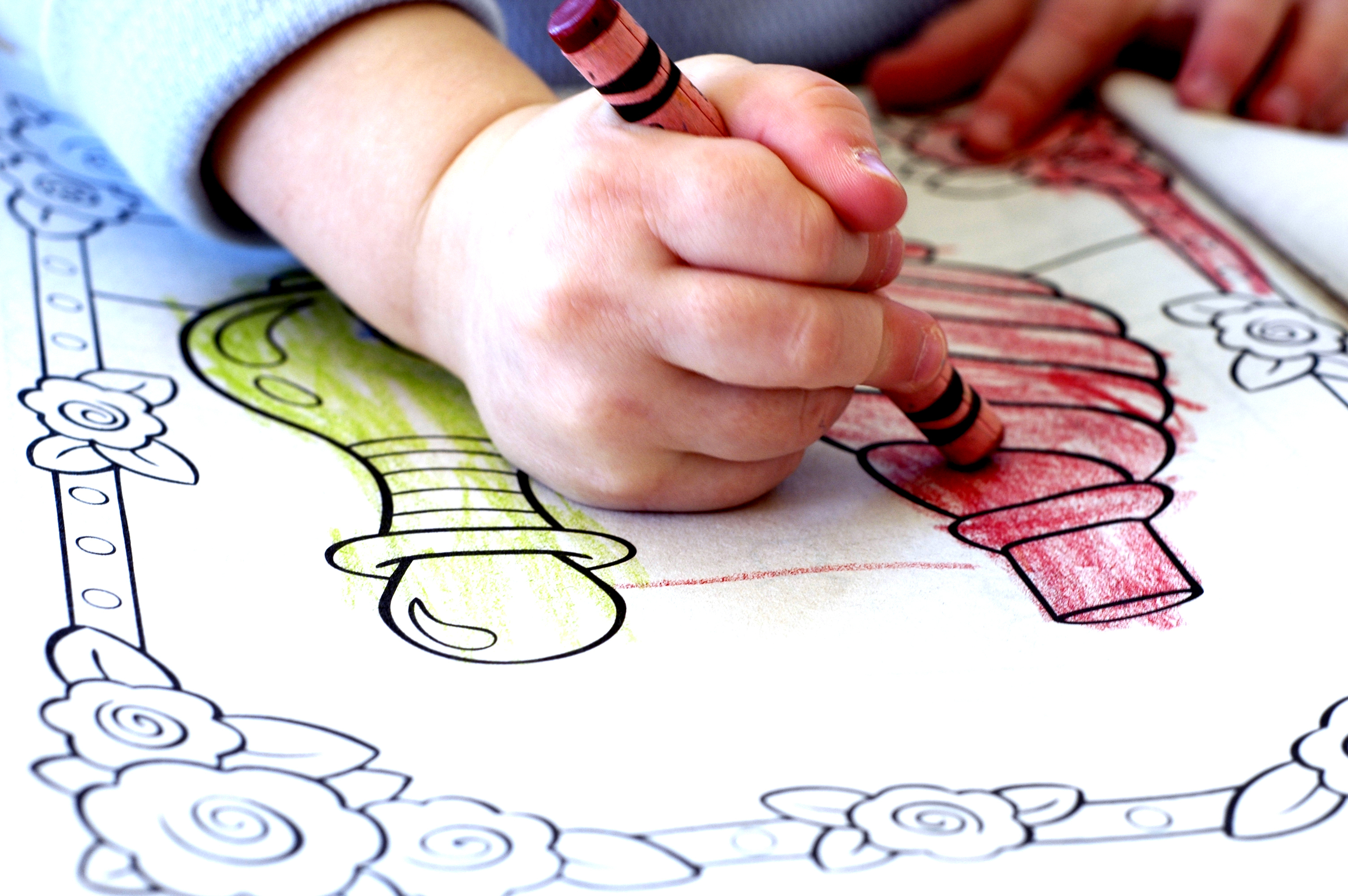A child coloring.