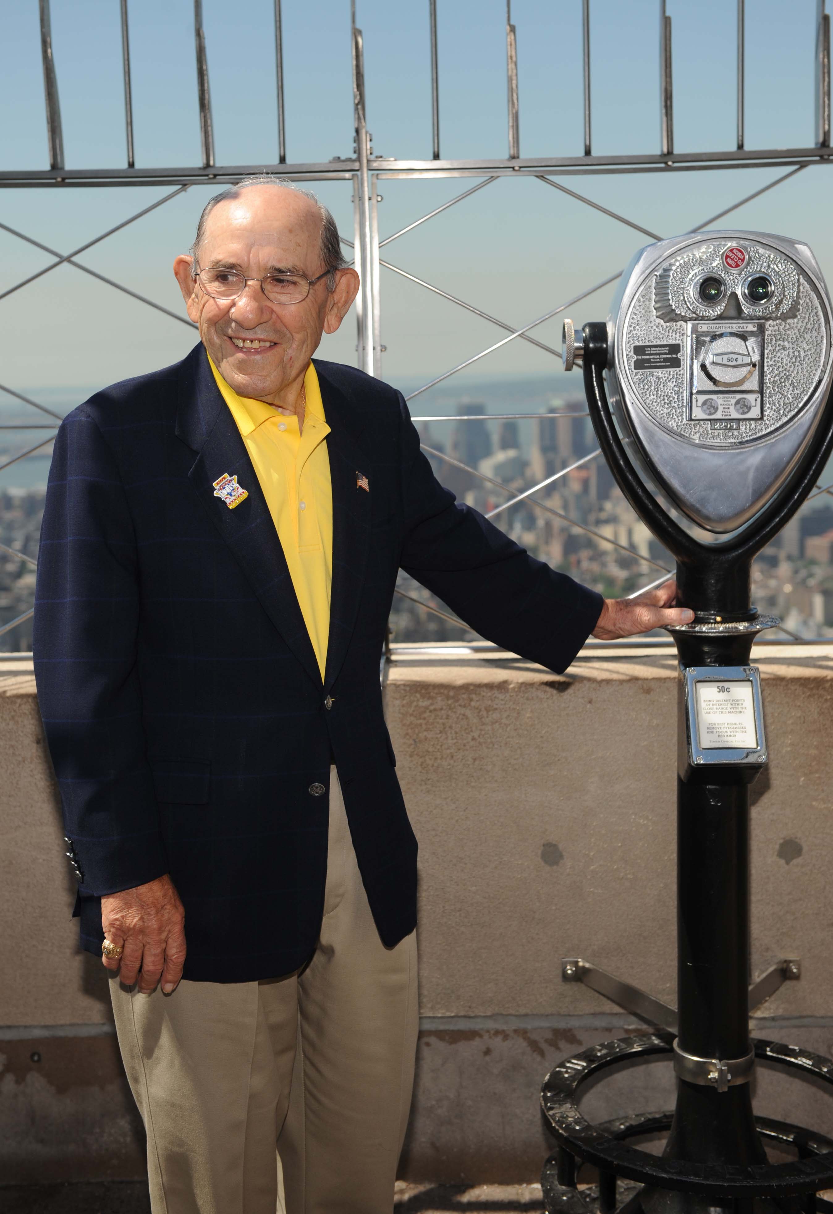 Former Major League Baseball player and manager Yogi Berra poses at a lighting ceremony at the Empire State Building in celebration of MLB All-Star Week July 11, 2008, in New York City. 