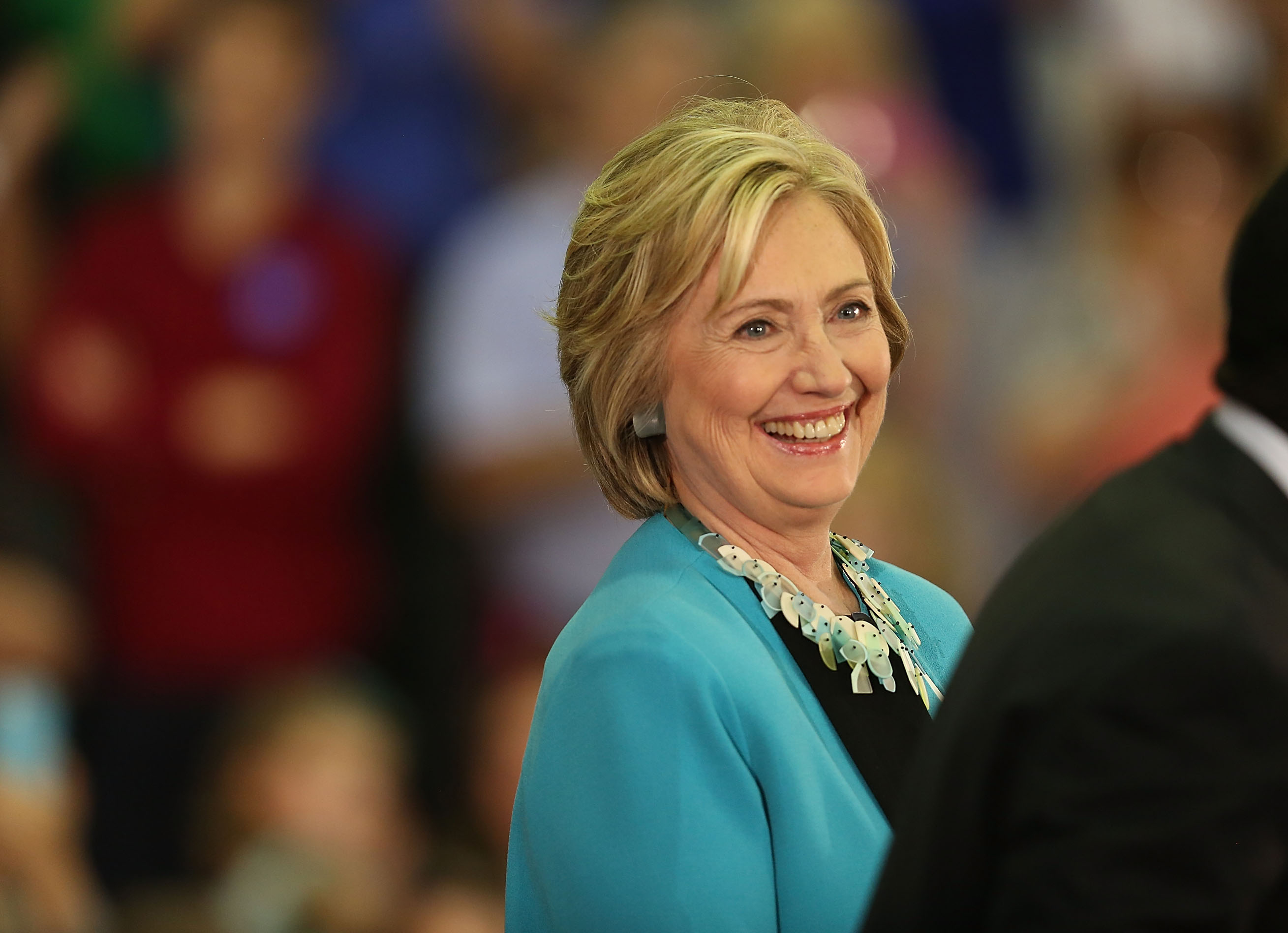 Democratic presidential candidate Hillary Clinton laughs as she is introduced during her campaign stop at the Broward College Ð Hugh Adams Central Campus on October 2, 2015, in Davie, Florida. 