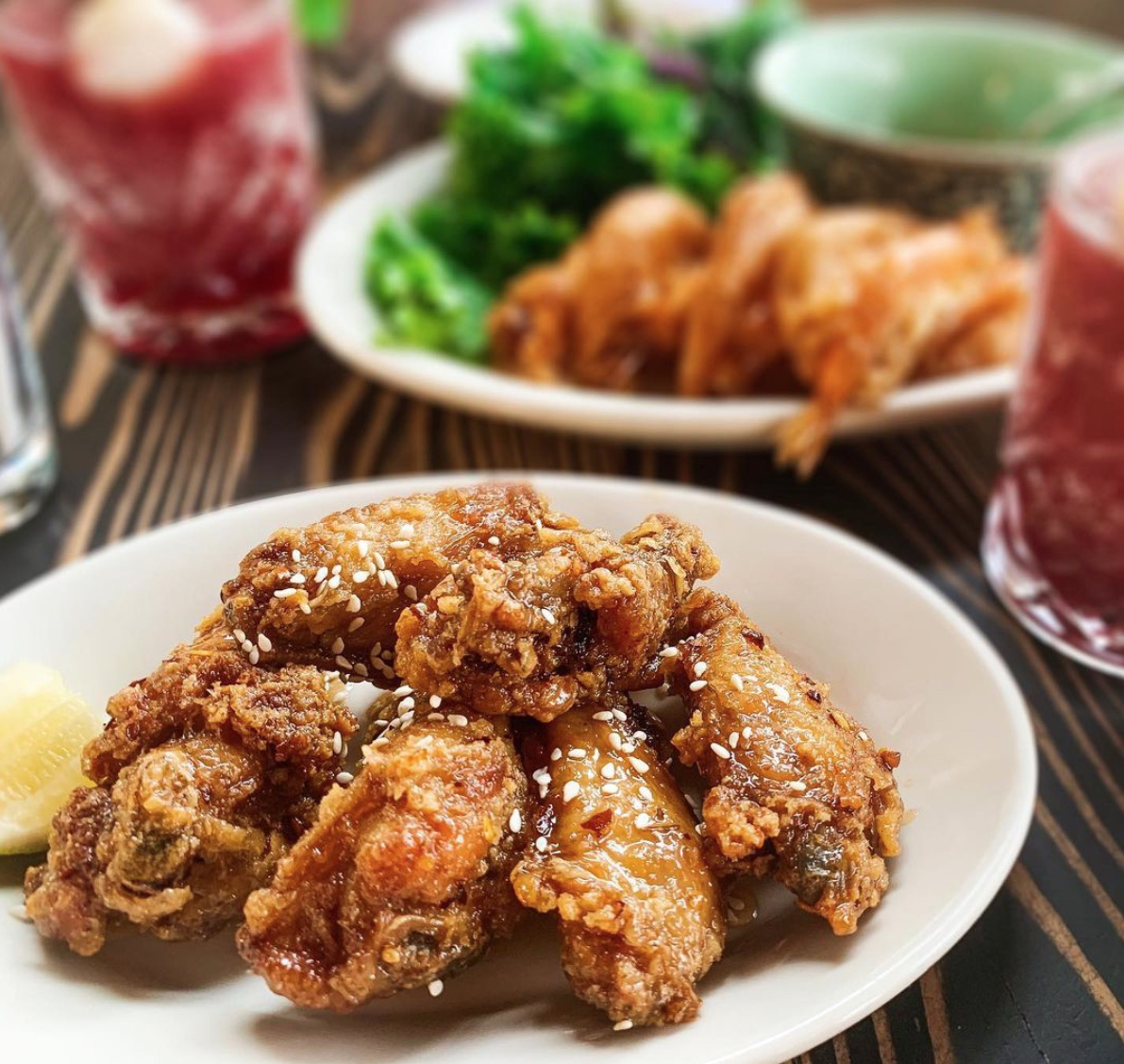 A plate of sticky glazed chicken wings.