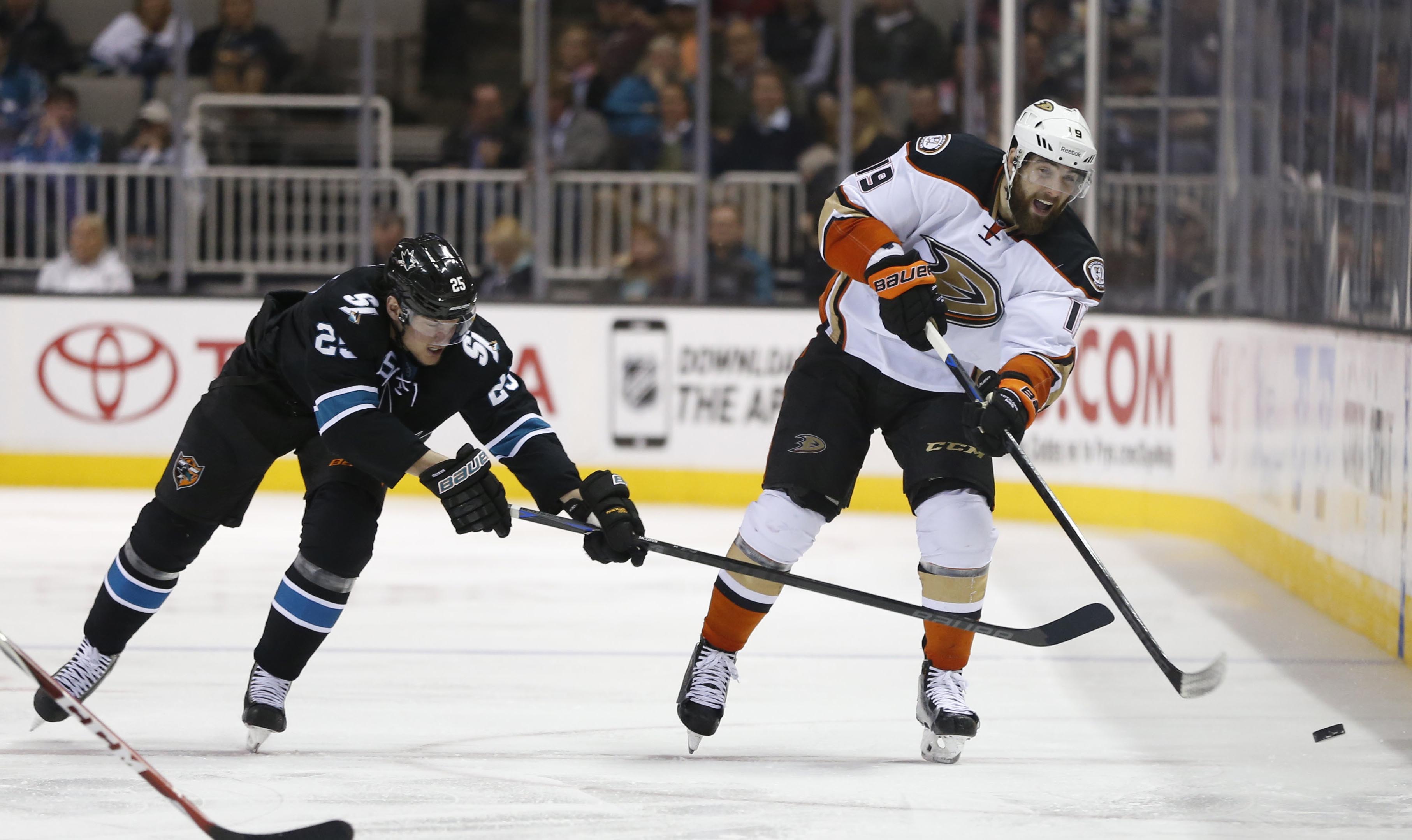 Patrick Maroon chips the puck in last season against the Sharks.