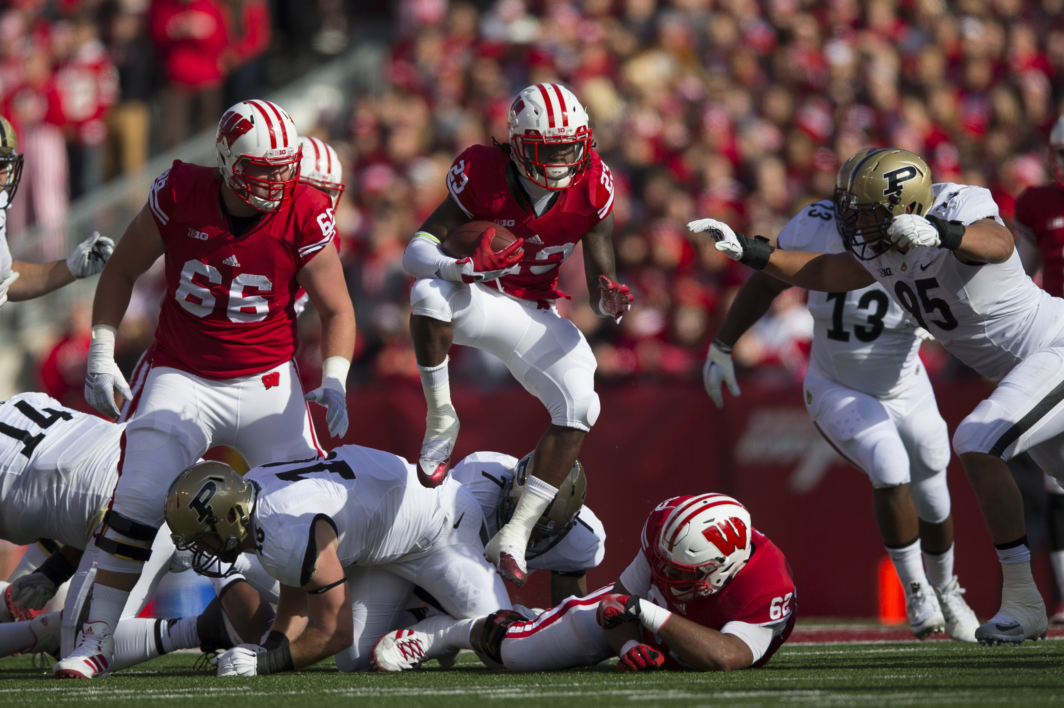 Dare Ogunbowale leaping over the pile in Wisconsin's win over Purdue on Saturday.