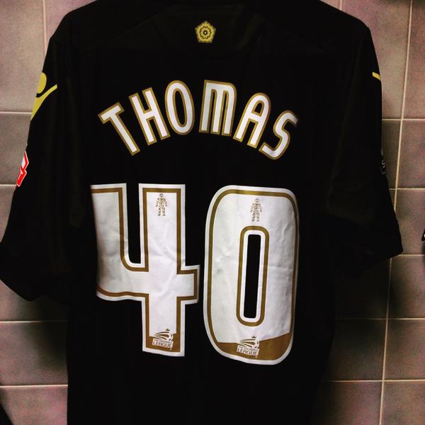 Jamie Thomas' matchday shirt hanging proudly in the shower room.