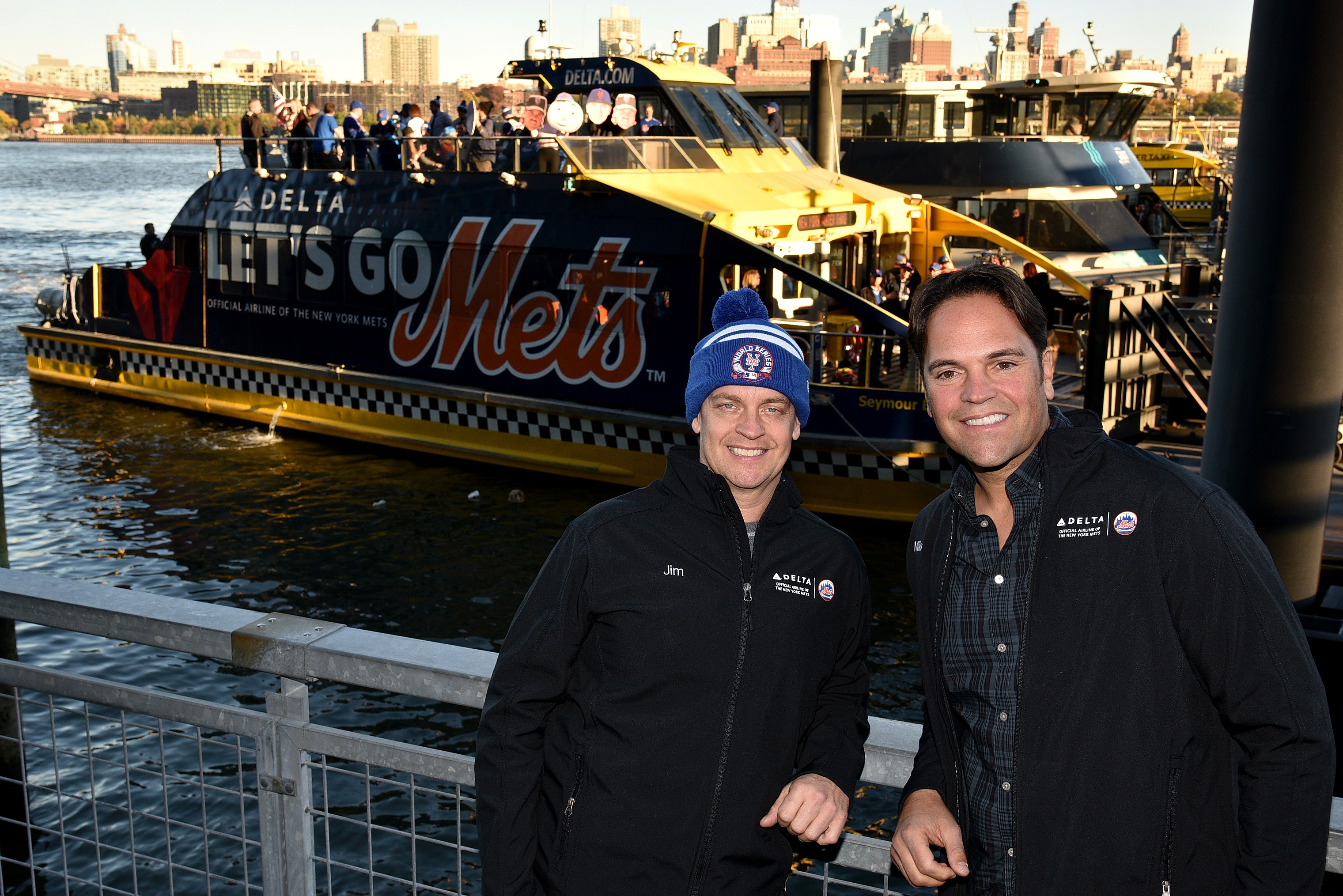 Jim Breuer and Mike Piazza in front of the Amazin' Mets Express.